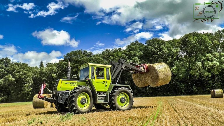 MB Trac 1300 Turbo balen laden met een achterlader